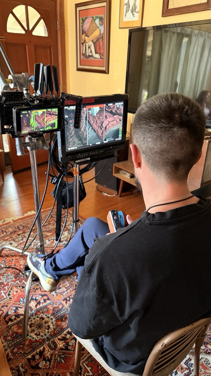 Camera and monitor set up in a living room interview